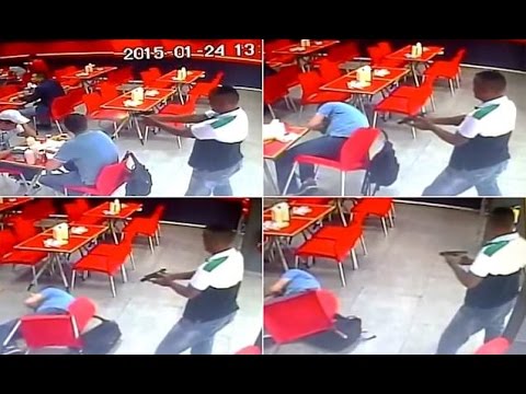 قاتل مأجور يطلق النار على رأس رجل