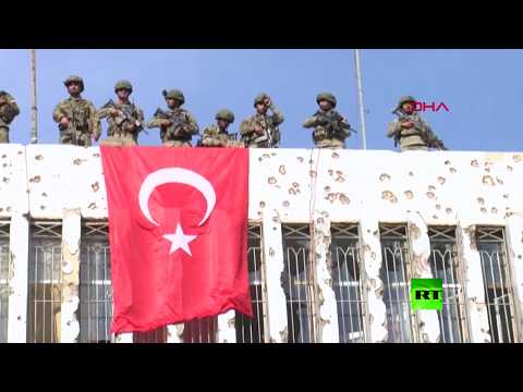 شاهد رفع علم تركيا وعلم الانتداب السوري في رأس العين