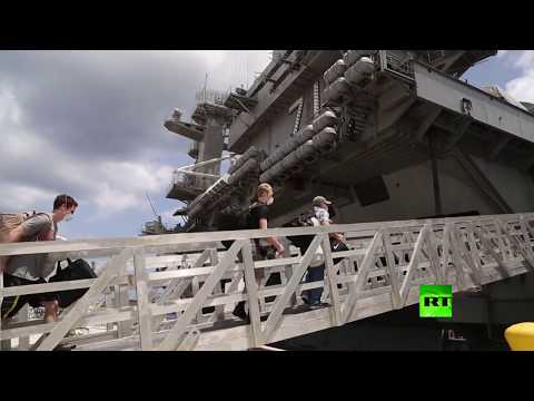 العسكريون يعودون إلى حاملة تيودور روزفلت الأميركية