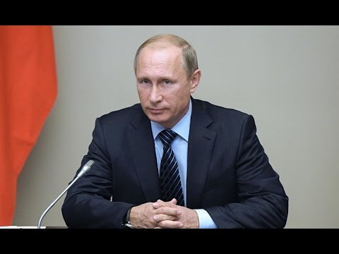 شاهد  بوتين ينفي وجود قوات روسية في سورية