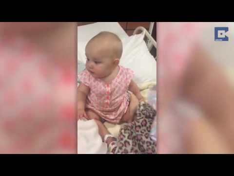 طفلة تصر على تقبيل مولود بالقوة