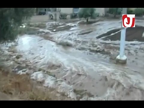 بالفيديو أضرار كبيرة وسيول جارفة تلحق خسائر مادية في عين تاوجطات